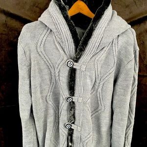 Mens knit sweater with faux fur lined hood